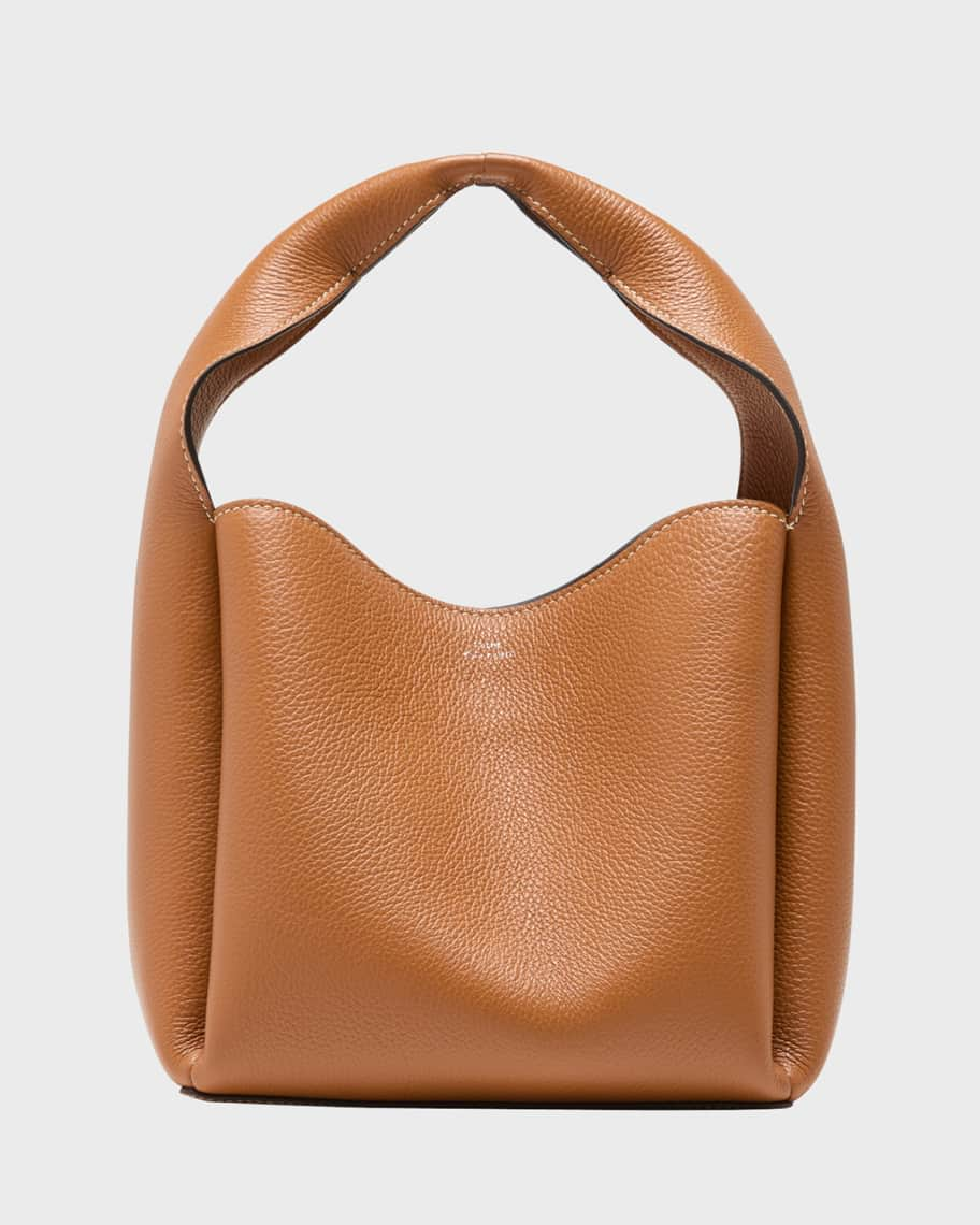 <p><a href="https://go.redirectingat.com?id=74968X1596630&url=https%3A%2F%2Fwww.neimanmarcus.com%2Fp%2Ftoteme-bucket-bag-in-pebble-grain-leather-prod267520004&sref=https%3A%2F%2Fwww.harpersbazaar.com%2Ffashion%2Ftrends%2Fg60114148%2Fbest-designer-bucket-bags%2F" rel="nofollow noopener" target="_blank" data-ylk="slk:Shop Now;elm:context_link;itc:0;sec:content-canvas" class="link ">Shop Now</a></p><p>Bucket Bag</p><p>neimanmarcus.com</p><p>$1080.00</p><span class="copyright">neimanmarcus.com</span>