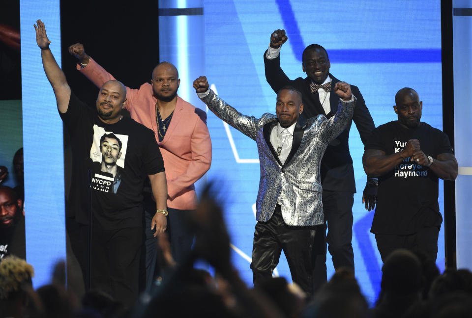 Raymond Santana Jr, from left, Kevin Richardson, Korey Wise, Yusef Salaam, and Antron McCray, also known as The Exonerated Five, introduce a performance by H.E.R. and YBN Cordae at the BET Awards on Sunday, June 23, 2019, at the Microsoft Theater in Los Angeles. (Photo by Chris Pizzello/Invision/AP)