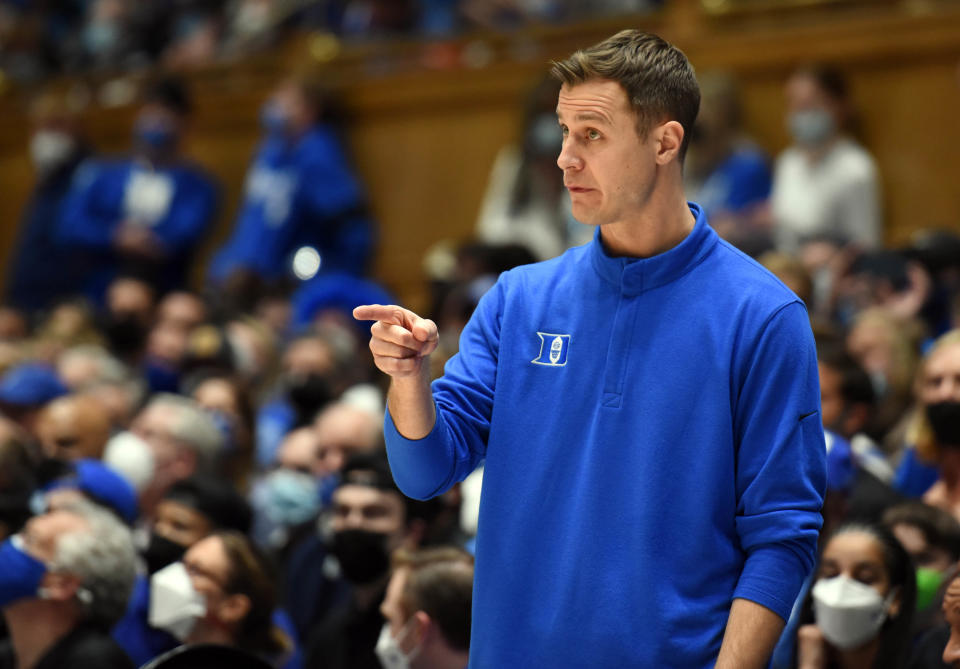 Feb 15, 2022; Durham, North Carolina, USA; Duke Blue Devils associate head coach Jon Scheyer gestures during the second half against the Wake Forest Demon Deacons at Cameron Indoor Stadium. The Blue Devils won 76-74. Mandatory Credit: Rob Kinnan-USA TODAY Sports