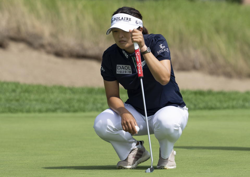 Jin Young Ko, of South Korea, lines up a putt on the 11th hole during the first round of the CP Women's Open golf tournament, Thursday, Aug. 25, 2022, in Ottawa. (Adrian Wyld/The Canadian Press via AP)