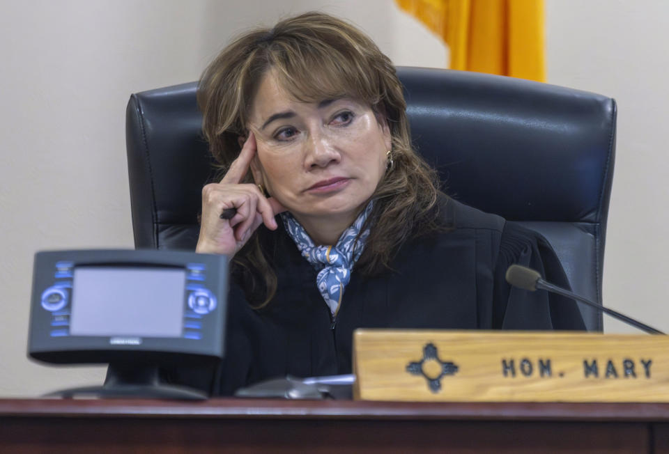 District Judge Mary Marlowe Sommer listens to Dr. Heather Jarell, chief medical investigator for the Office of the Medical Investigator, testify at District Court in Santa Fe, N.M., on Tuesday, Feb. 27, 2024, during Hannah Gutierrez-Reed's trial. Luis Sánchez Saturno/Santa Fe New Mexican via AP, Pool)