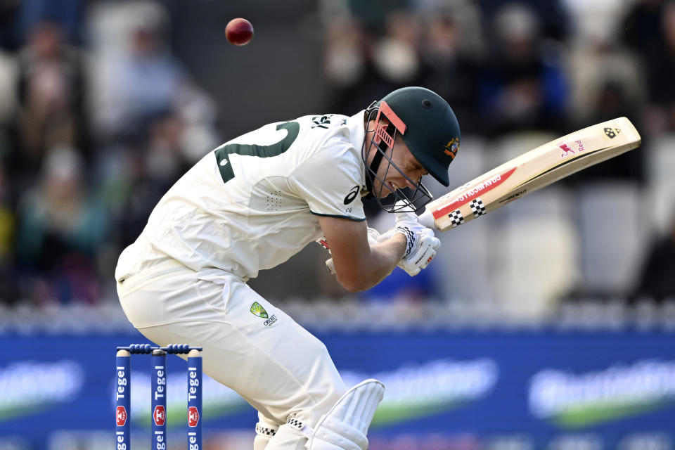 Australia's Cameron Green ducks a bouncer while batting against New Zealand on the first day of their cricket test match in Wellington, New Zealand, Thursday, Feb. 29, 2024. (Andrew Cornaga/Photosport via AP)