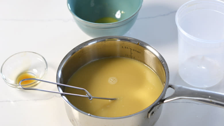 Combined wet ingredients for takoyaki batter in bowl