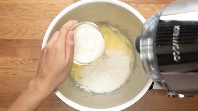 Pouring milk to cake batter