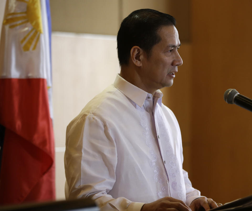 Philippine Foreign Affairs Spokesman Raul Hernandez reads his government's statement against Hong Kong's decision in Manila, Philippines, Thursday, Jan. 30, 2014. Hong Kong said holders of official Philippine government passports will no longer be allowed to visit for up to 14 days without visas starting Feb. 5. Hong Kong will end visa-free visits by Philippine officials because their government has not apologized for the deaths of eight Hong Kong tourists nearly four years ago. (AP Photo/Bullit Marquez)