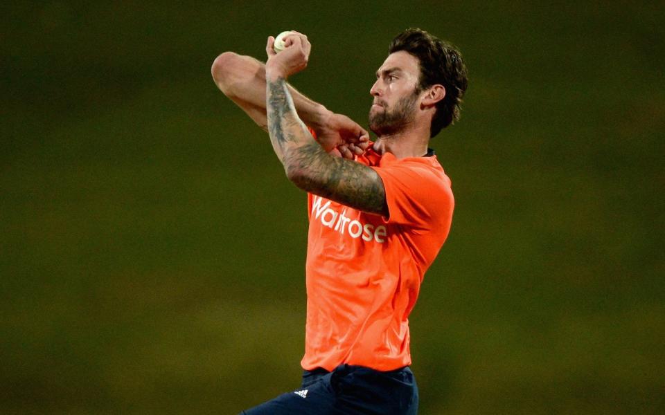 Reece Topley bowling for England - GETTY IMAGES