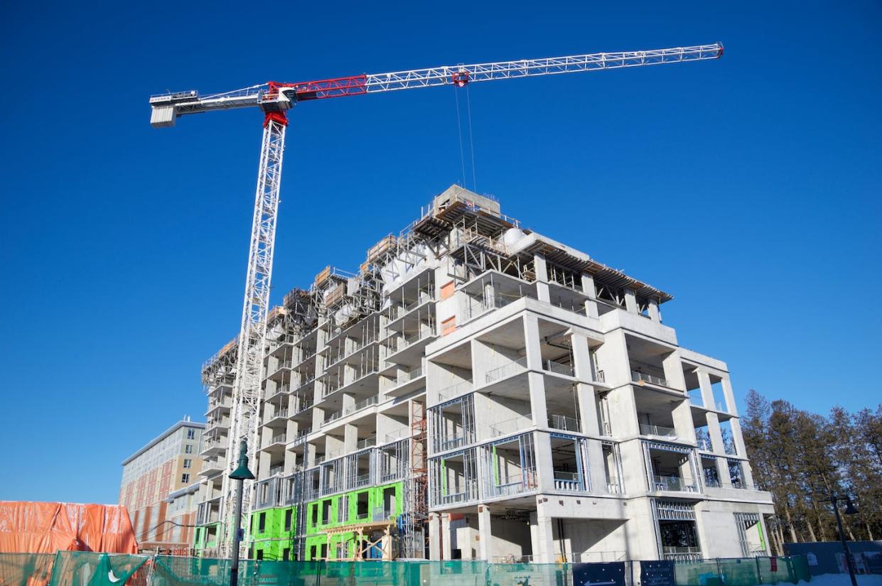 A building under construction in Toronto. According to Canada's national housing agency, Ontario needs to build 1.8 million new homes to alleviate the housing crisis. (Shutterstock)