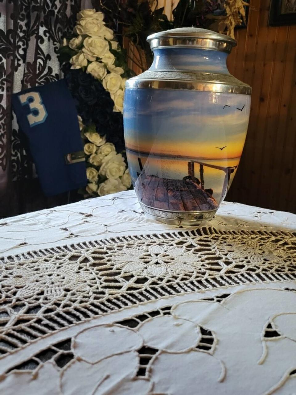 The urn holding Trevon Perry’s ashes in his family’s home.