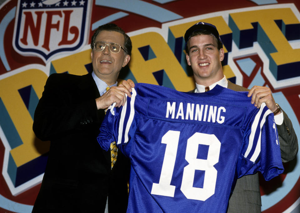 NFL commissioner Paul Tagliabue and a very, very young Peyton Manning. (Photo by Al Pereira/Getty Images)