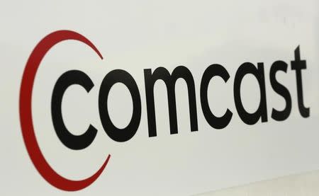 A Comcast sign is shown in San Francisco, California February 13, 2014. REUTERS/Robert Galbraith