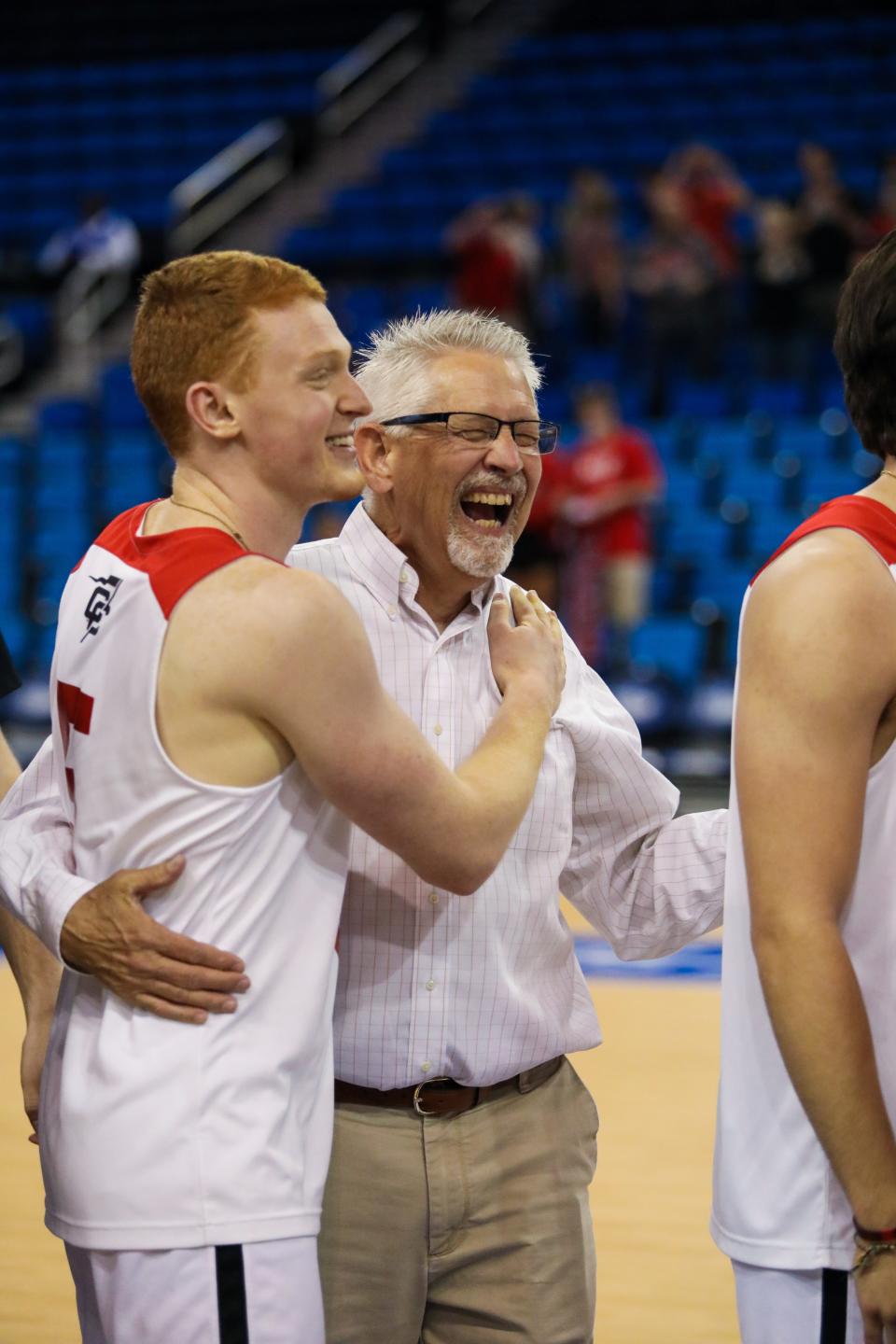 North Greenville University men's volleyball coach Dr. Fred Battenfield celebrates after the Crusaders swept Princeton on May 1, 2022 at UCLA's Pauley Pavilion in Los Angeles, California.