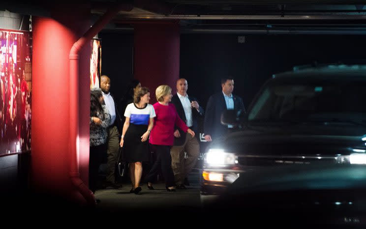 Hillary Clinton wore a red pants suit to attend Adele's concert. 