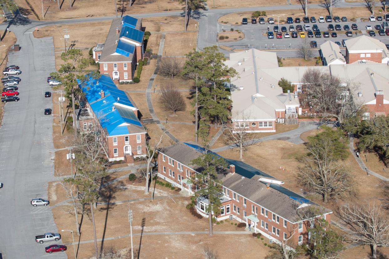 Tarp covered buildings at Camp Lejeune in February 2019, five months after Hurricane Florence.