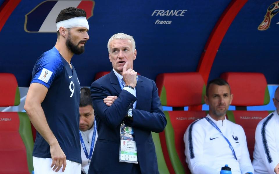 France's head coach Didier Deschamps (R) may start Olivier Giroud (L) against Peru on Thursday - AFP