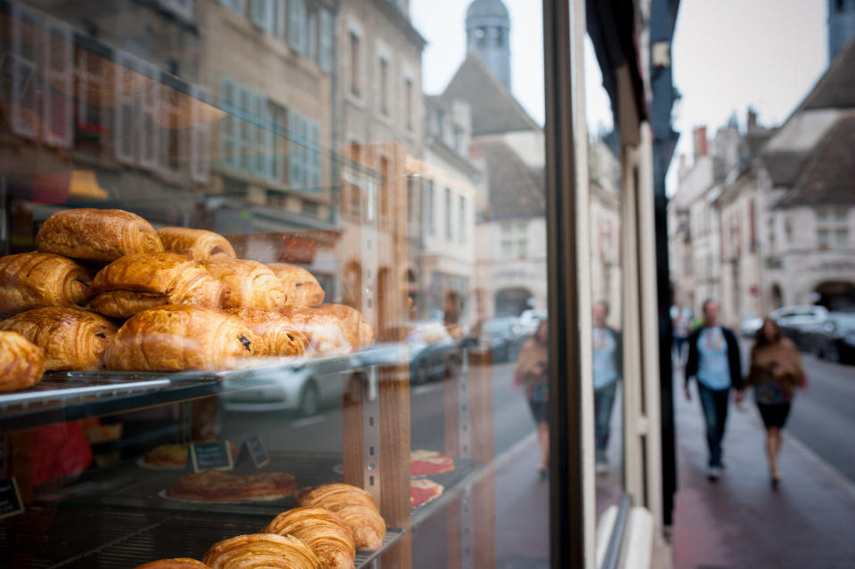 Fresh croissants in a window.