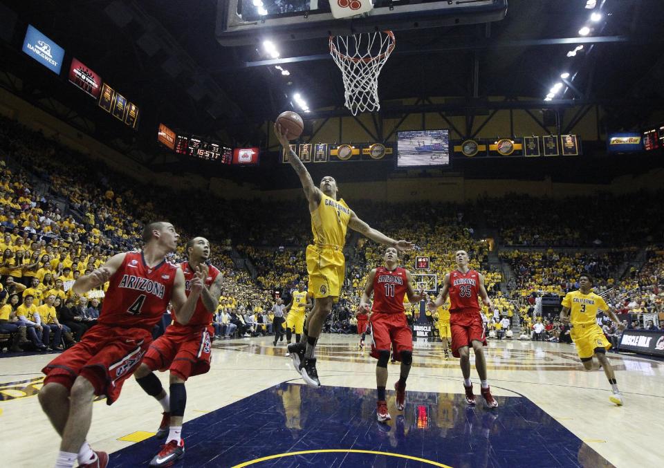 California 's Justin Cobbs (1) scores against Arizona during the second half on an NCAA college basketball game on Saturday, Feb. 1, 2014, in Berkeley, Calif. California won 60-58. (AP Photo/Marcio Jose Sanchez)