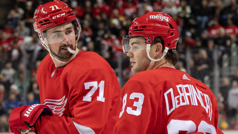 Red Wings forwards Dylan Larkin (71) and Alex DeBrincat have cooled off after their hot starts. (Photo by Dave Reginek/NHLI via Getty Images)