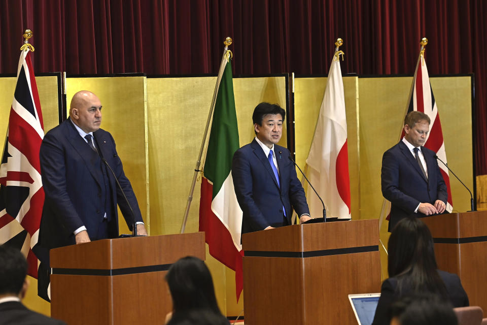 Britain's Defense Minister Grant Shapps, right, Italy's Defense Minister Guido Crosetto, left, and Japanese Defense Minister Minoru Kihara, center, attend a joint press conference after a signing ceremony for Global Combat Air Programme (GCAP) at the defense ministry Thursday, Dec. 14, 2023, in Tokyo, Japan. (David Mareuil/Pool Photo via AP)