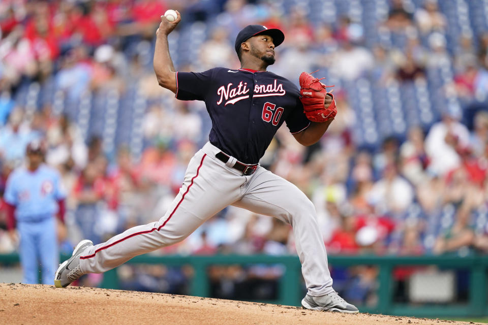 Washington Nationals' Joan Adon pitches during the second inning of a baseball game against the Philadelphia Phillies, Thursday, July 7, 2022, in Philadelphia. (AP Photo/Matt Slocum)
