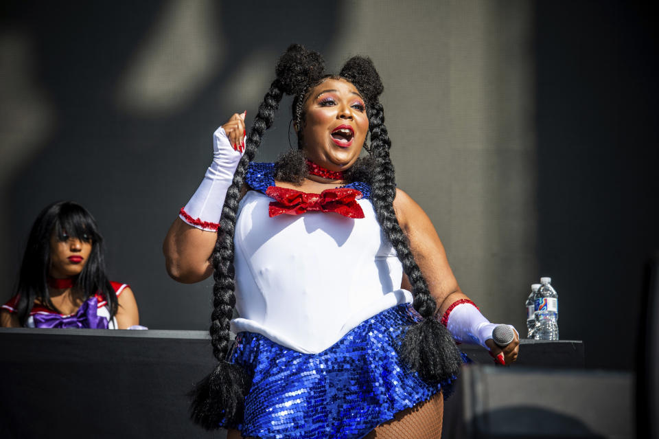 FILE - This Oct. 27, 2018 file photo shows Lizzo performing at the Voodoo Music Experience in New Orleans. Genre-mashing, bold and chart-topping new artists have caught the attention of the Recording Academy, as Lizzo, Billie Eilish and Lil Nas X lead in nominations at the 2020 Grammy Awards. (Photo by Amy Harris/Invision/AP, File)