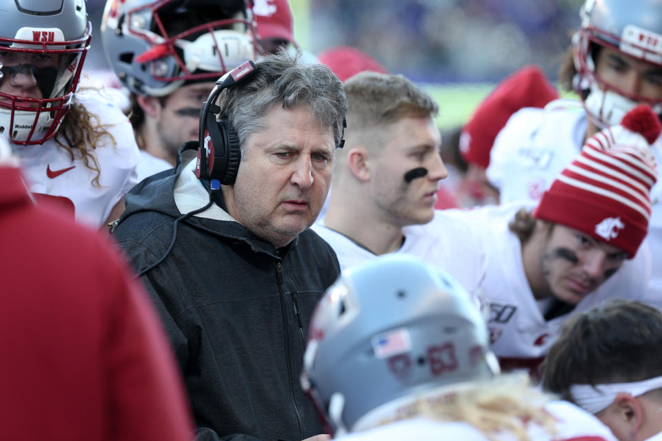 SEATTLE, WA - NOVEMBER 29: Washington State head coach Mike Leach huddles with his offensive unit on the sidelines during the college football game between the Washington Huskies and the Washington State Cougars on November 29, 2019 at Husky Stadium in Seattle, WA. (Photo by Jesse Beals/Icon Sportswire via Getty Images)