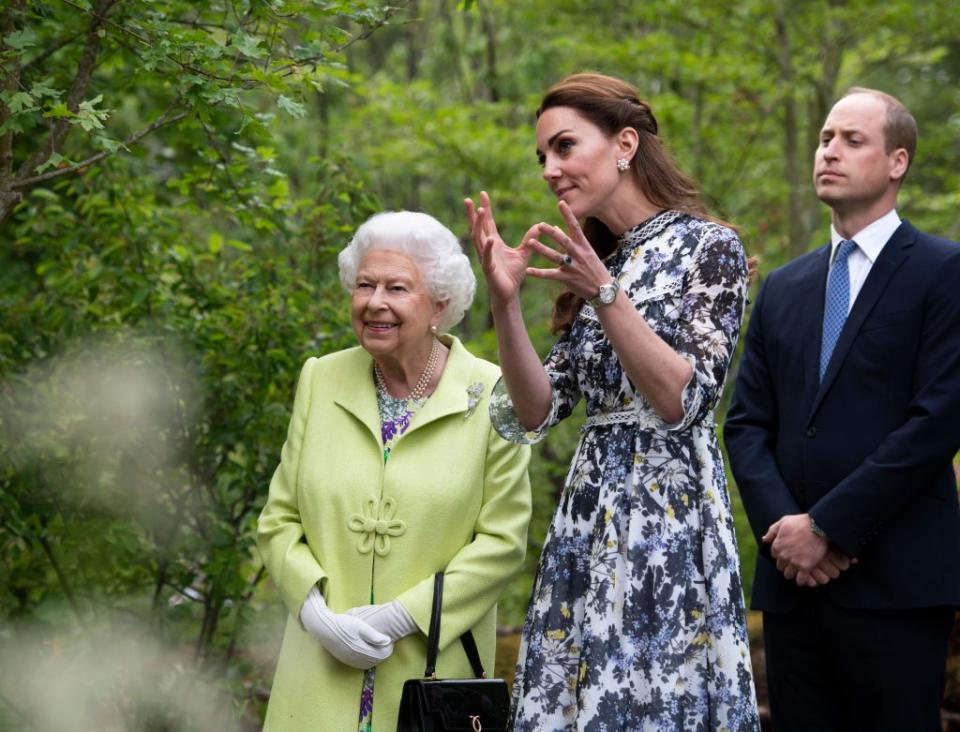5) Kate gives the Queen a tour of her garden.