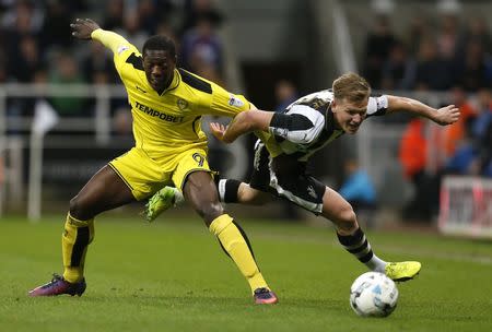 Britain Soccer Football - Newcastle United v Burton Albion - Sky Bet Championship - St James' Park - 5/4/17 Matt Ritchie of Newcastle United (R) and Marvin Sordell of Burton Albion in action Mandatory Credit: Action Images / Ed Sykes Livepic