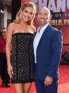 <p>Chrishell Stause and Jason Oppenheim attend Disney's premiere of<em> Shang-Chi and the Legend of the Ten Rings</em> at El Capitan Theatre on Aug. 16 in L.A.</p>