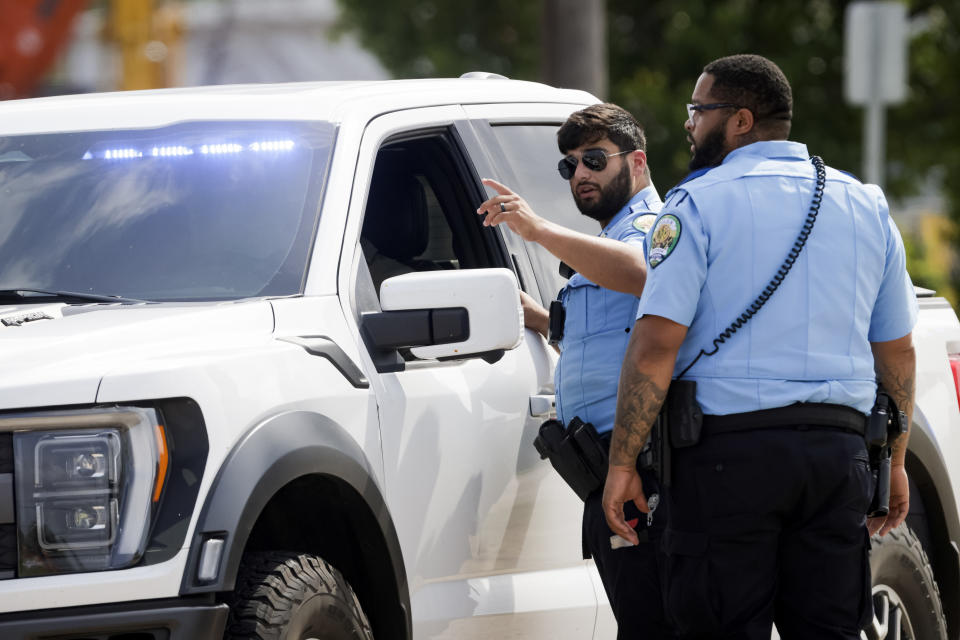 Police respond after three Louisiana police officers were shot in a standoff Sunday, April 28, 2024, in Kenner, La. (Scott Threlkeld/The Times-Picayune/The New Orleans Advocate via AP)