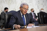 Sen. Bob Menendez, D-N.J., opens a Senate Foreign Relations Committee on Capitol Hill in Washington, Wednesday, Aug. 4, 2021. (AP Photo/Amanda Andrade-Rhoades)