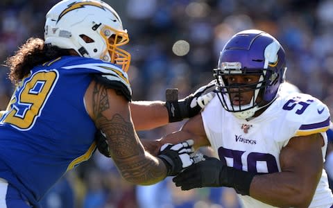 Minnesota Vikings defensive end Danielle Hunter (right) works against Los Angeles Chargers offensive tackle Sam Tevi (69) during the first quarter at Dignity Health Sports Park - Credit: USA Today