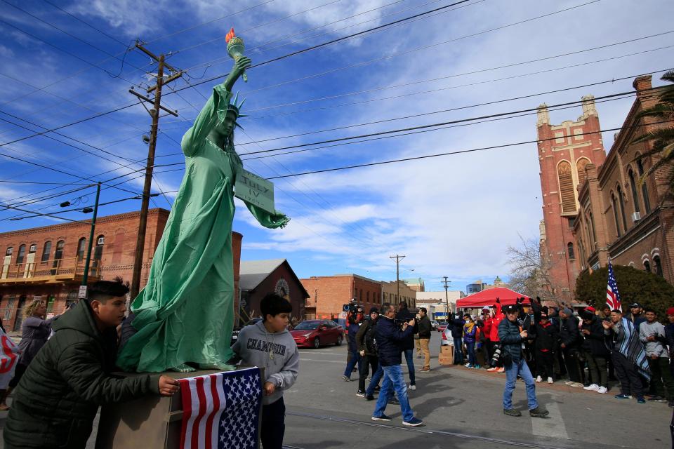 Activists organized a march from Chihuahuita Park to Sacred Heart Church to protest the expansion of Title 42 ahead of President Joe Biden’s visit to El Paso on Jan. 7. Migrants outside Sacred Heart joined the demonstration as protesters shouted, “You are not alone!” while law enforcement officials looked on.