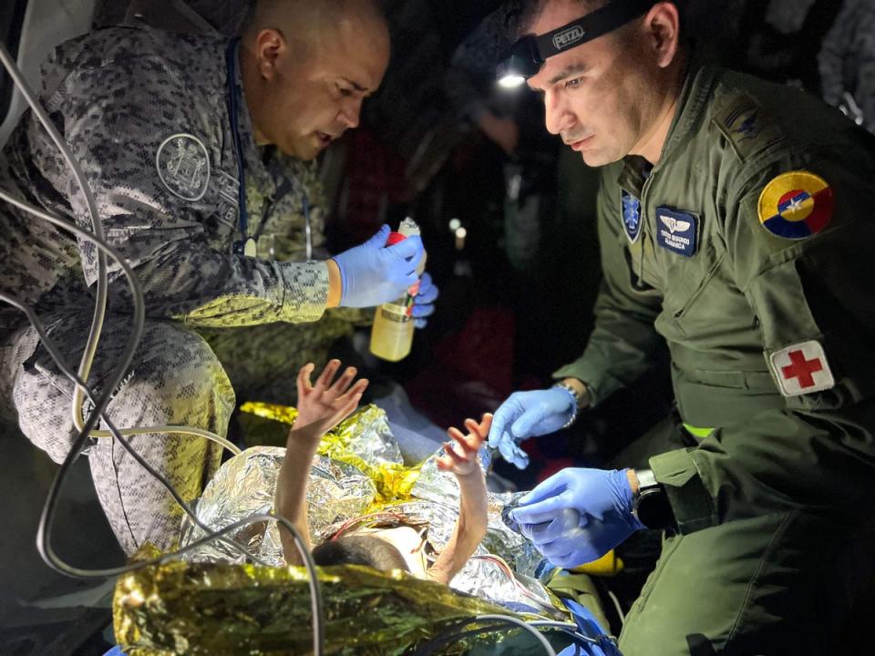 Medics with the Colombian Army evaluate the children’s condition (Colombian Presidency/AFP via Get)