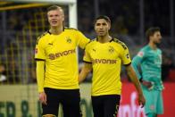 Erling Braut Haaland (L) was among the goals again as Borussia Dortmund crushed Eintracht Frankfurt 4-0 in the Bundesliga