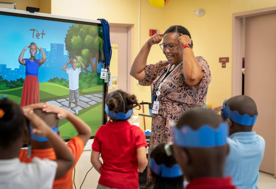 Dual-language teacher Frangia Mesadieu speaks to her students in Creole at Lake Park Elementary School in Lake Park, Florida on August 10, 2023.