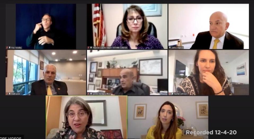 Miami-Dade Mayor Daniella Levine Cava, bottom left, leads a press conference Friday, Dec. 4, 2020, on the rising COVID-19 risk in the county.