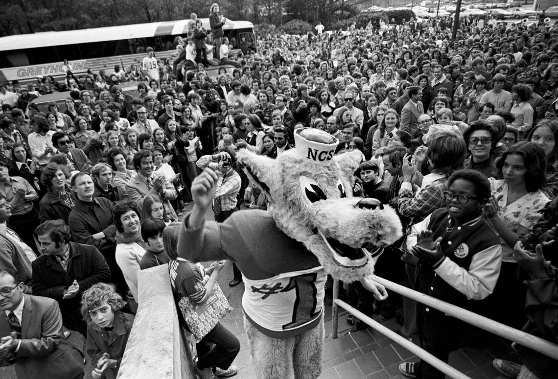 The NC State mascot and fans send off the Wolfpack as they depart for the 1974 Final Four.