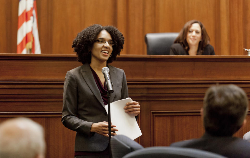 Leondra Kruger stands at a microphone as she addresses the Commission of Judicial Appointments during her confirmation hearing to the California Supreme Court.