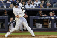 New York Yankees' Josh Donaldson hits a one-run home run in the eighth inning of a baseball game against the San Francisco Giants, Saturday, April 1, 2023, in New York. (AP Photo/Mary Altaffer)