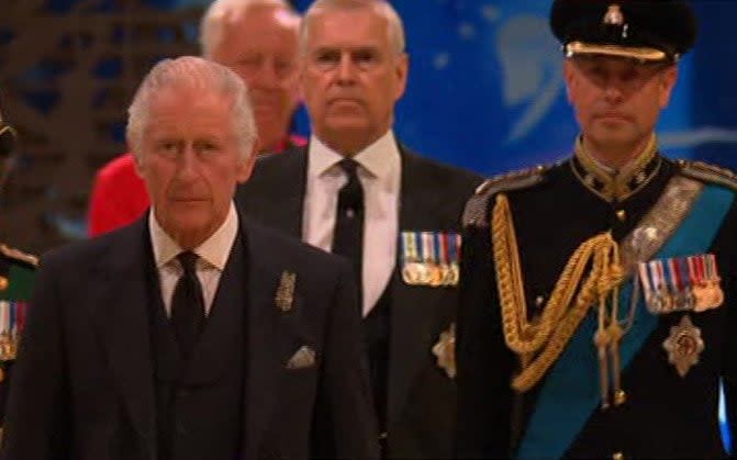 The Queen's children walk to the late monarch's coffin to perform the Vigil of the Princes - Sky News