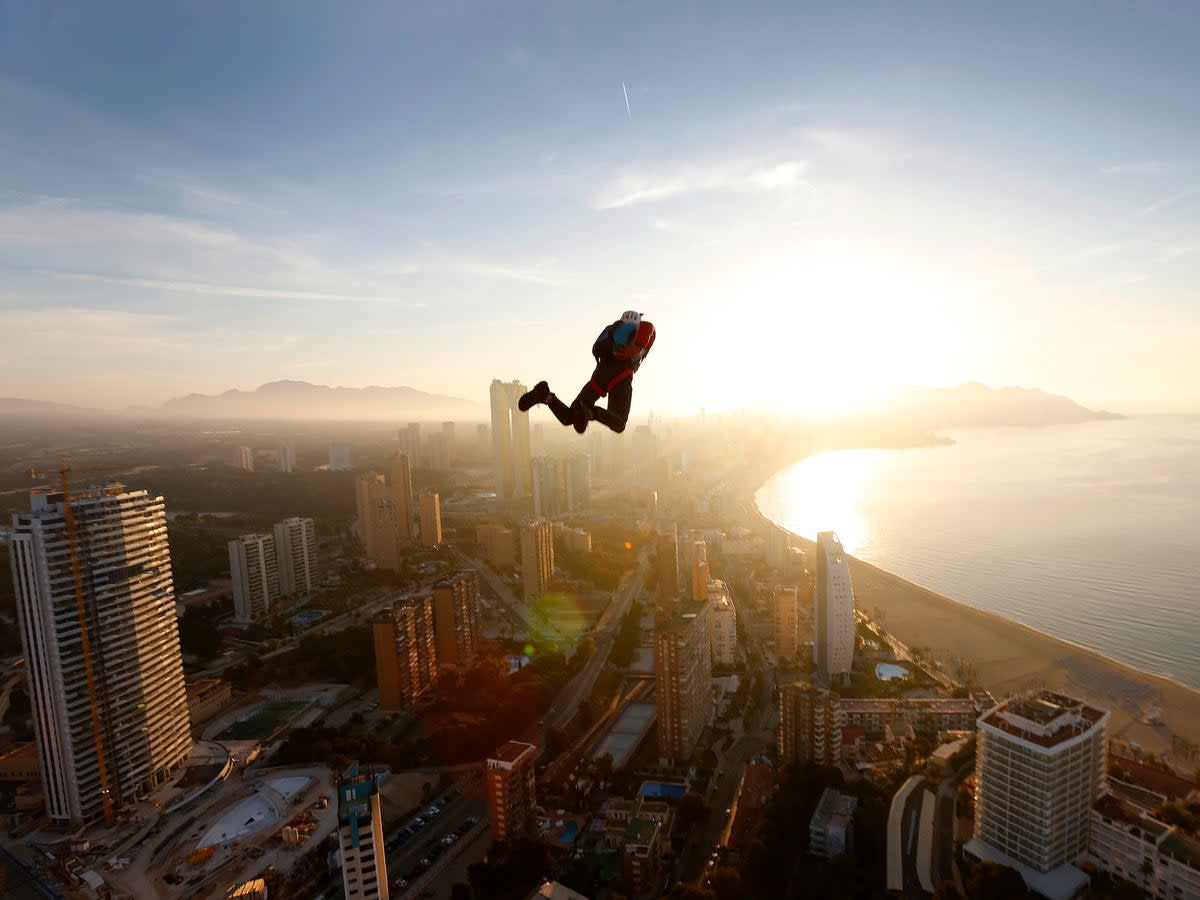 A base jumper in action during the BASE Jump Extreme World Championship at Gran Hotel Bali in Benidorm, Spain (EPA)