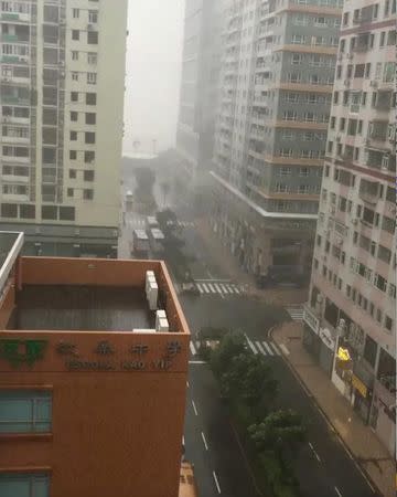 A storm batters a street in Macau during Typhoon Hato, in this still image taken from social media video obtained by Reuters August 24, 2017. MANDATORY CREDIT Deo Carmel Viste/via REUTERS