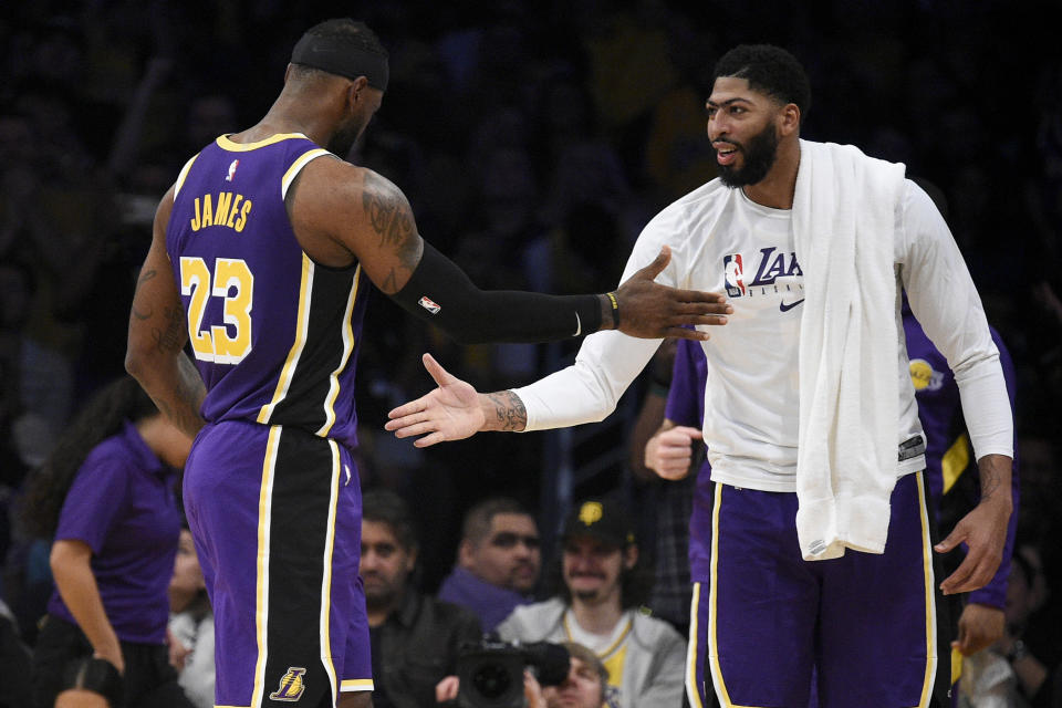 The LeBron James-Anthony Davis dynamic started to take shape in Sunday's win over the Charlotte Hornets. (Kelvin Kuo/Reuters)