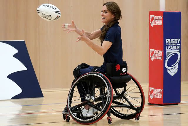 <p>SCOTT HEPPELL/POOL/AFP via Getty </p> Kate Middleton takes part in wheelchair rugby game.