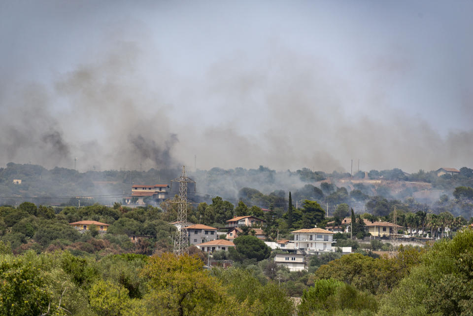 CATANIA, ITALY â AUGUST 01: Smoke rises as southern Italy still burning, the fires that have hit Sicily in recent days do not subside and new outbreaks are developing in many areas affected by a strong heat wave on August 01, 2021. The interventions carried out by the firefighters have no end in Sicily, they have been over 250 in the last 24 hours, many of these fires that have affected Catania have kept the firefighters busy until late at night, the numerous fires, including arson, have created too much damage by making the air unbreathable, making it necessary in some cases to evacuate the inhabitants and leading to the closure of the Catania airport for a few hours. Catania August 01, 2021. (Photo by Salvatore Allegra/Anadolu Agency via Getty Images)