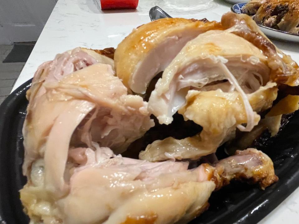 Meijer rotisserie chicken cut up into pieces in container