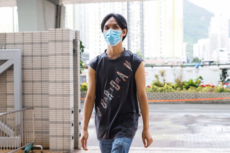 Pro-democracy activist Hendick Lui Chi Hang, one of the 47 pro-democracy activists charged with conspiracy to commit subversion under the national security law, arrives West Kowloon Magistrates's Courts building, in Hong Kong