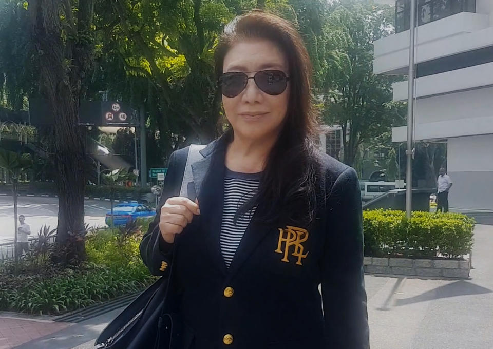 Shi Ka Yee seen leaving the court on 16 July 2018 after admitting to one charge of obstructing traffic.