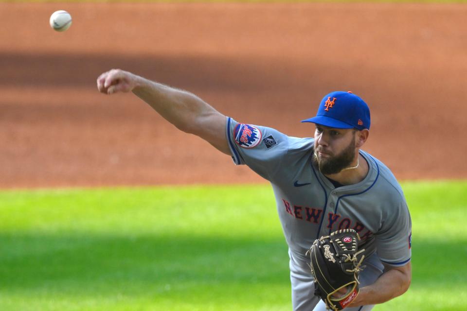 May 21, 2024; Cleveland, Ohio, USA; New York Mets starting pitcher Adrian Houser (35) delivers a pitch in the first inning against the Cleveland Guardians at Progressive Field. Mandatory Credit: David Richard-USA TODAY Sports