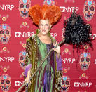 <p>The 70-year-old actress brought her <i>Hocus Pocus</i> character Winifred Sanderson back to life for her annual Hulaween Party, which raises money for New York’s Restoration Project. From her voluminous red wig to her buck teeth, Midler totally nailed it. (Photo: Michael Loccisano/Getty Images) </p>